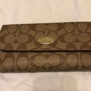 Brown coach wallet with checkbook